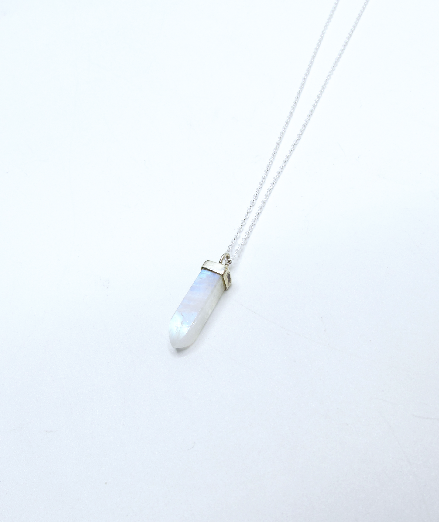 Rainbow Moonstone Crystal Point Pendant – Sterling Silver
